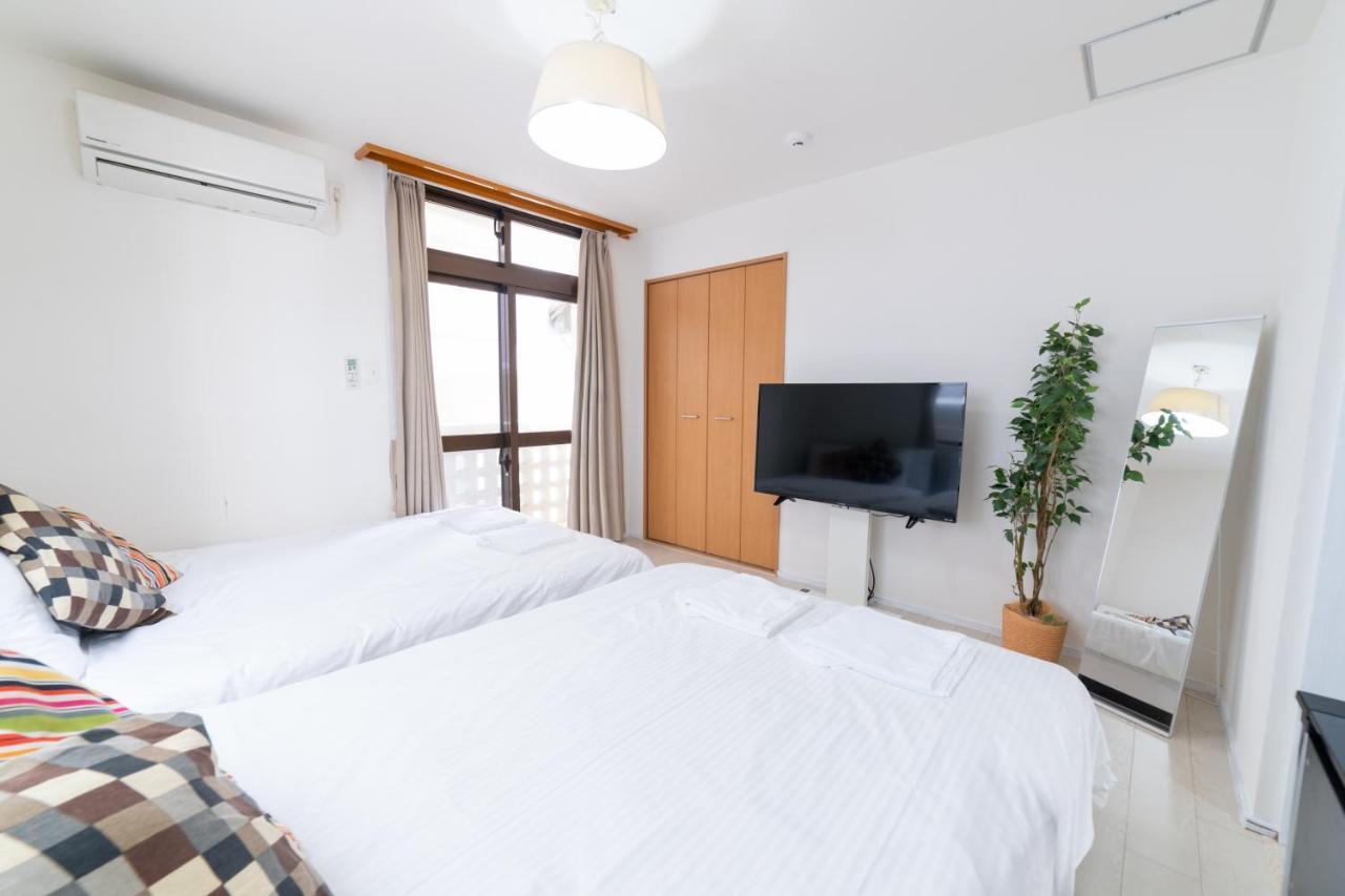 Апарт отель Izumisaki Terrace402 Наха Экстерьер фото